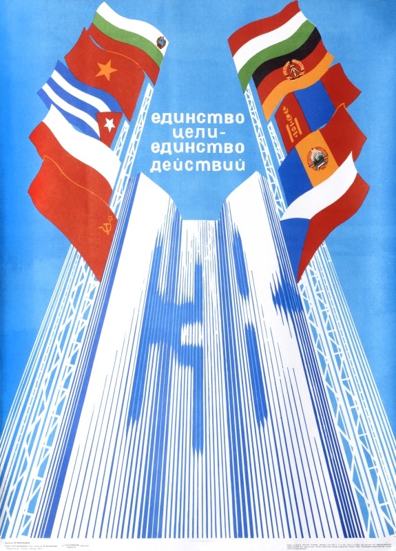 tall glass building, flags; white, blue, red